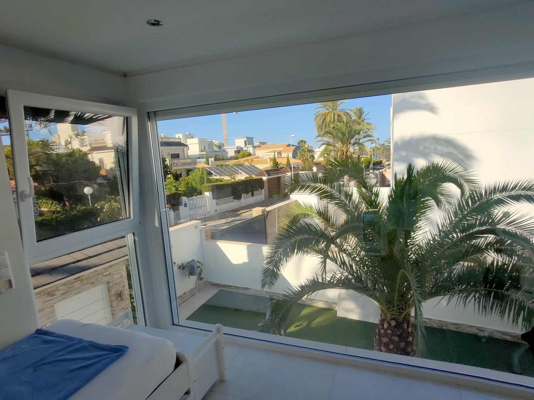 Pool area in villa for sale in Orihuela Costa