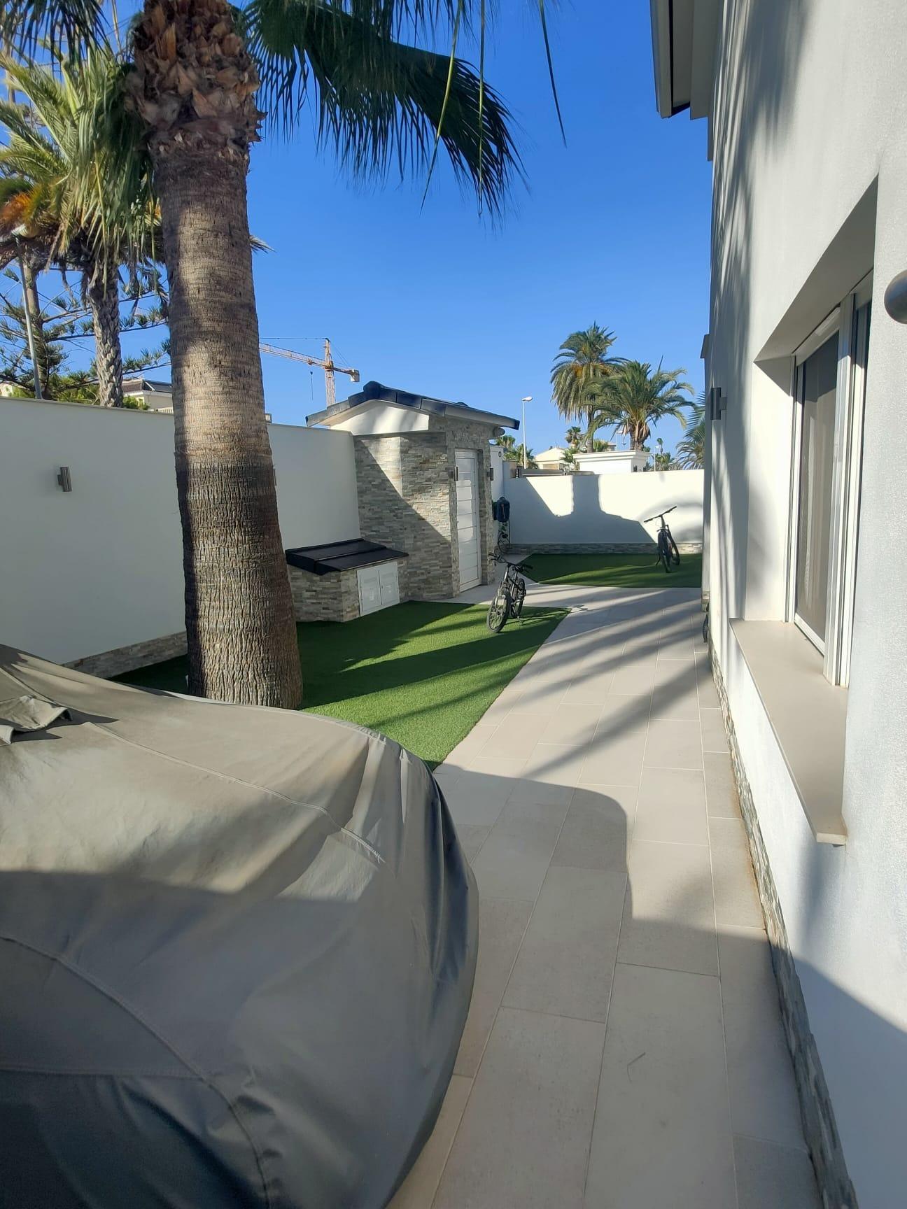 Pool area in villa for sale in Orihuela Costa