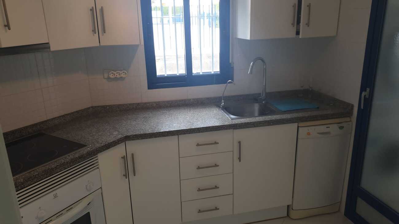 Pool area in apartment for sale in Cabo Roig