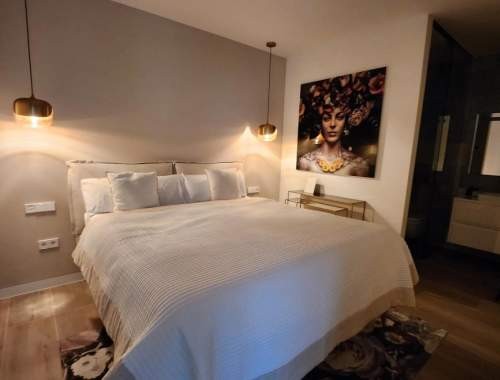 This brand new, luxuriously furnished penthouse with spectacular views is located on the prestigious