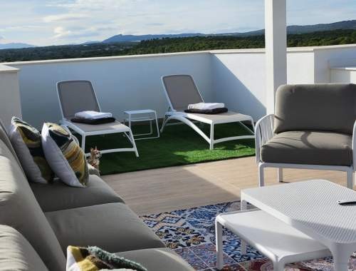 Pool area in penthouse for sale in Campoamor