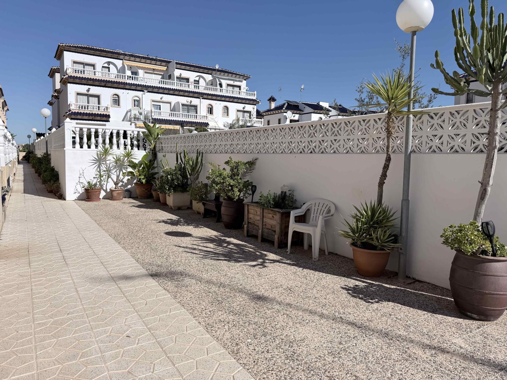 Pool area in terraced for sale in Orihuela Costa