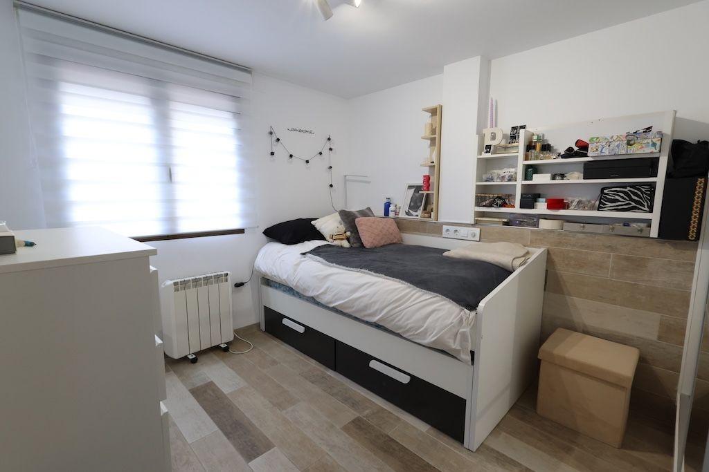Master bedroom in duplex for sale in Cabo Roig