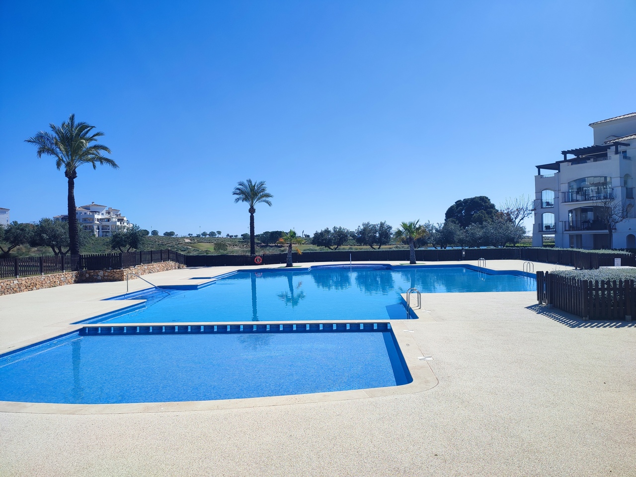 Pool area in apartment for sale in Hacienda Riquelme Golf Resort