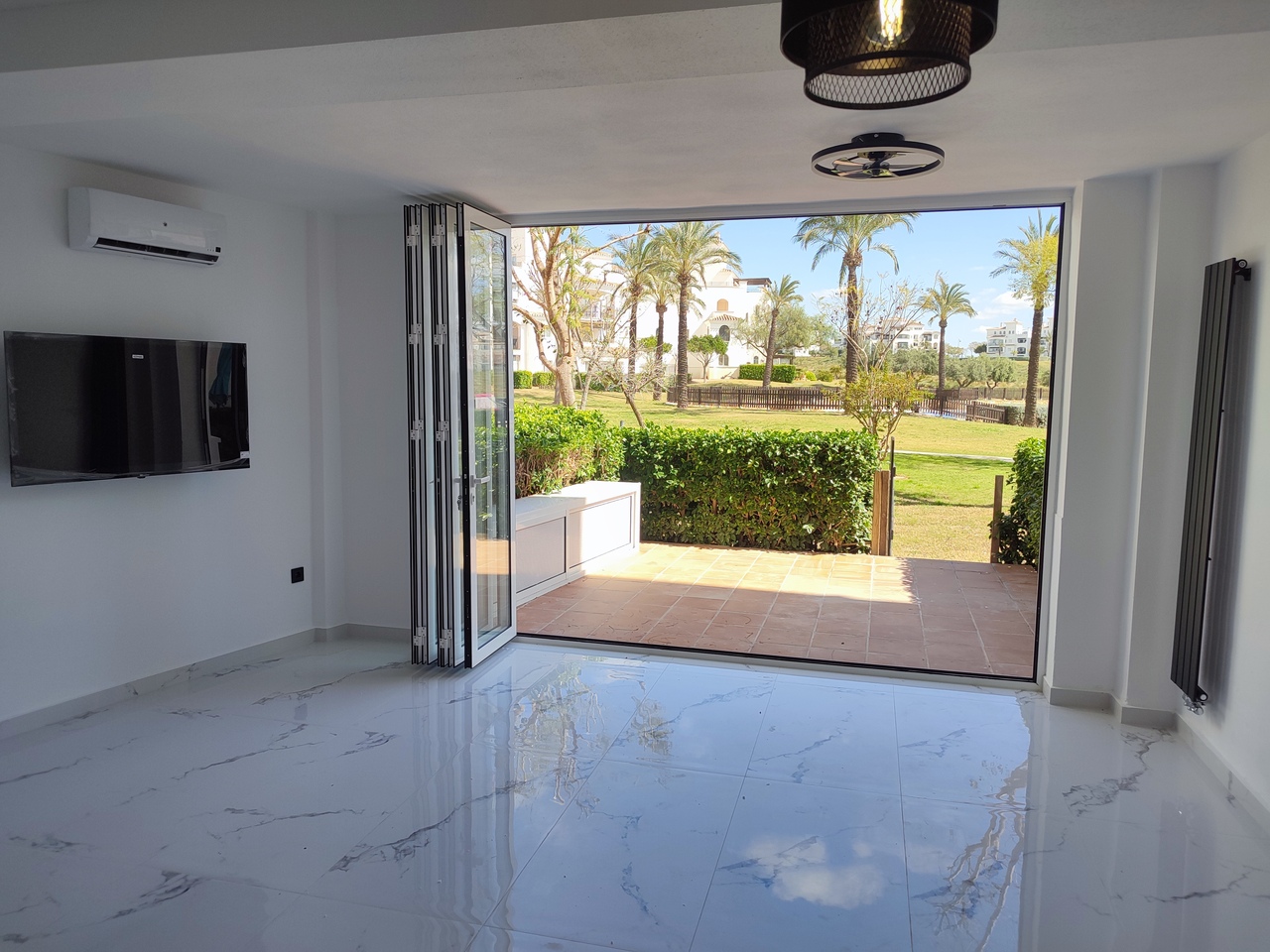 Living room in apartment for sale in Hacienda Riquelme Golf Resort