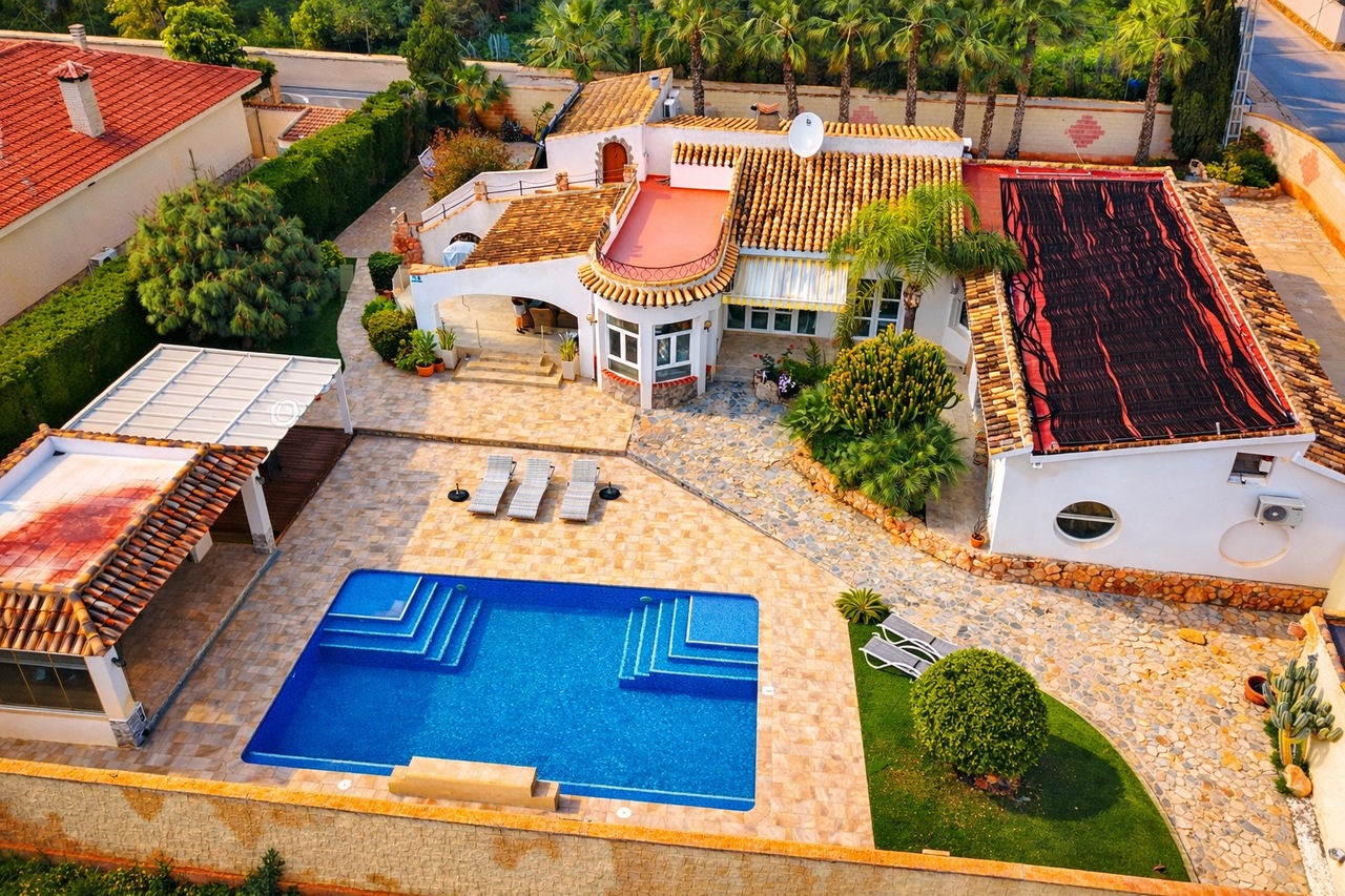Pool area in villa for sale in Cabo Roig