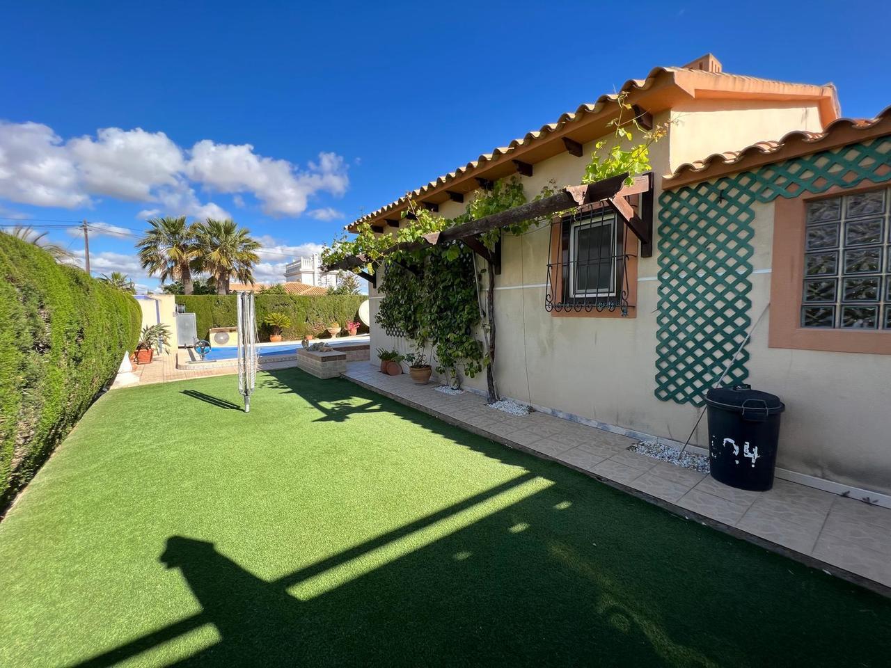 Living room in villa for sale in Cabo Roig