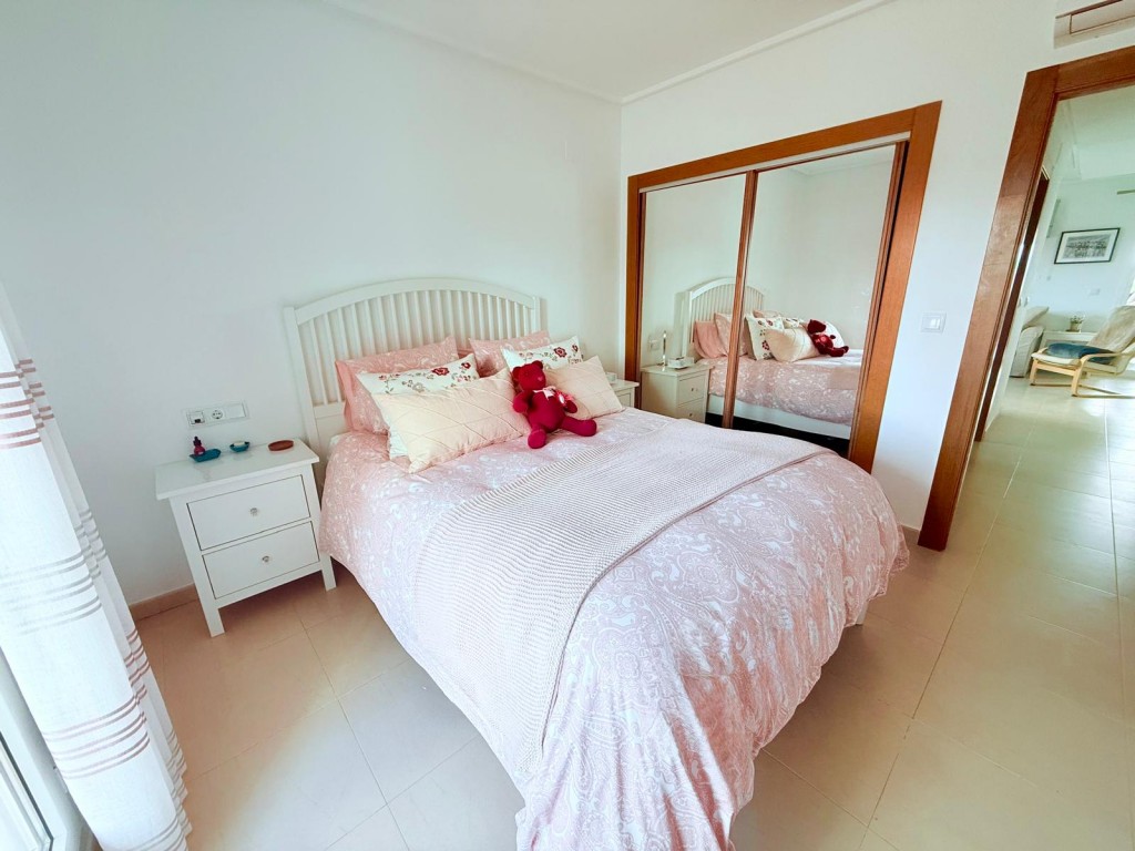 Master bedroom in duplex for sale in Hacienda Riquelme Golf Resort