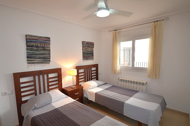 Master bedroom in apartment for sale in Hacienda Riquelme Golf Resort