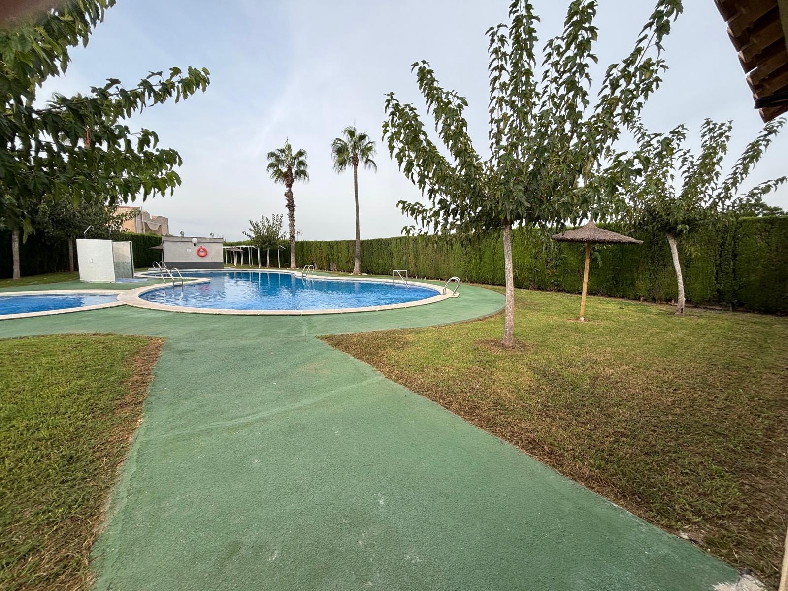 Pool area in bungalow for sale in Torrevieja