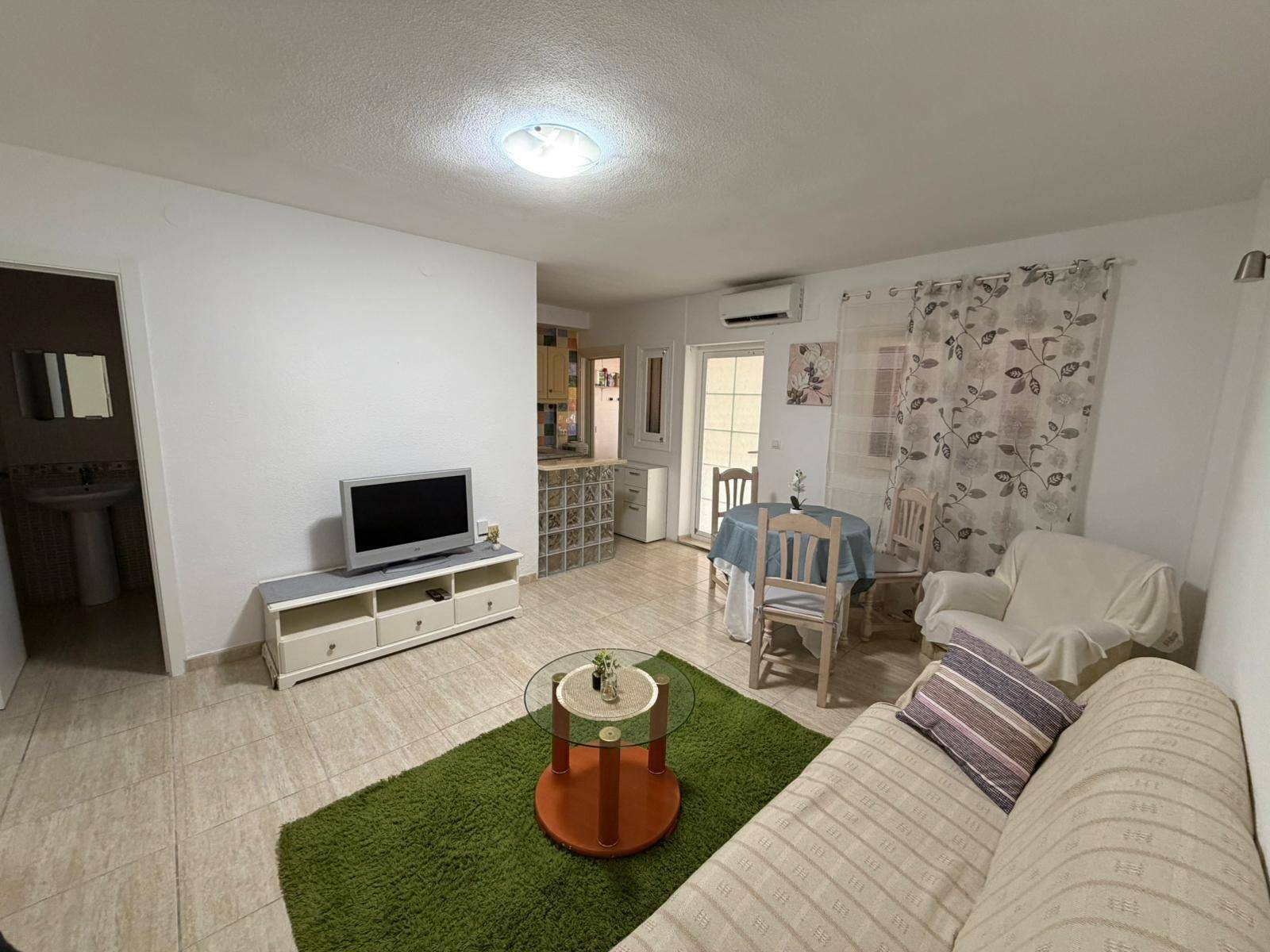 Discover this charming, renovated apartment in the La Regia area of Orihuela Costa