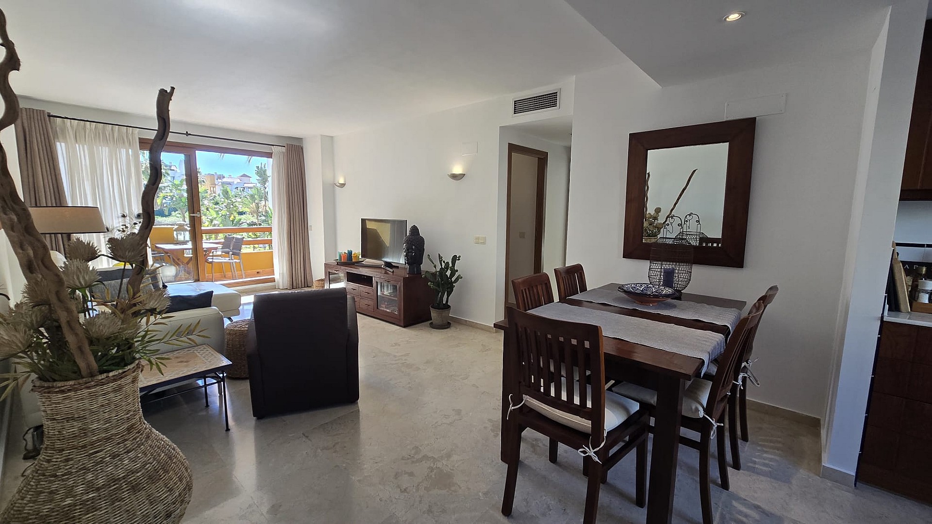 Living room in apartment for sale in Punta Prima