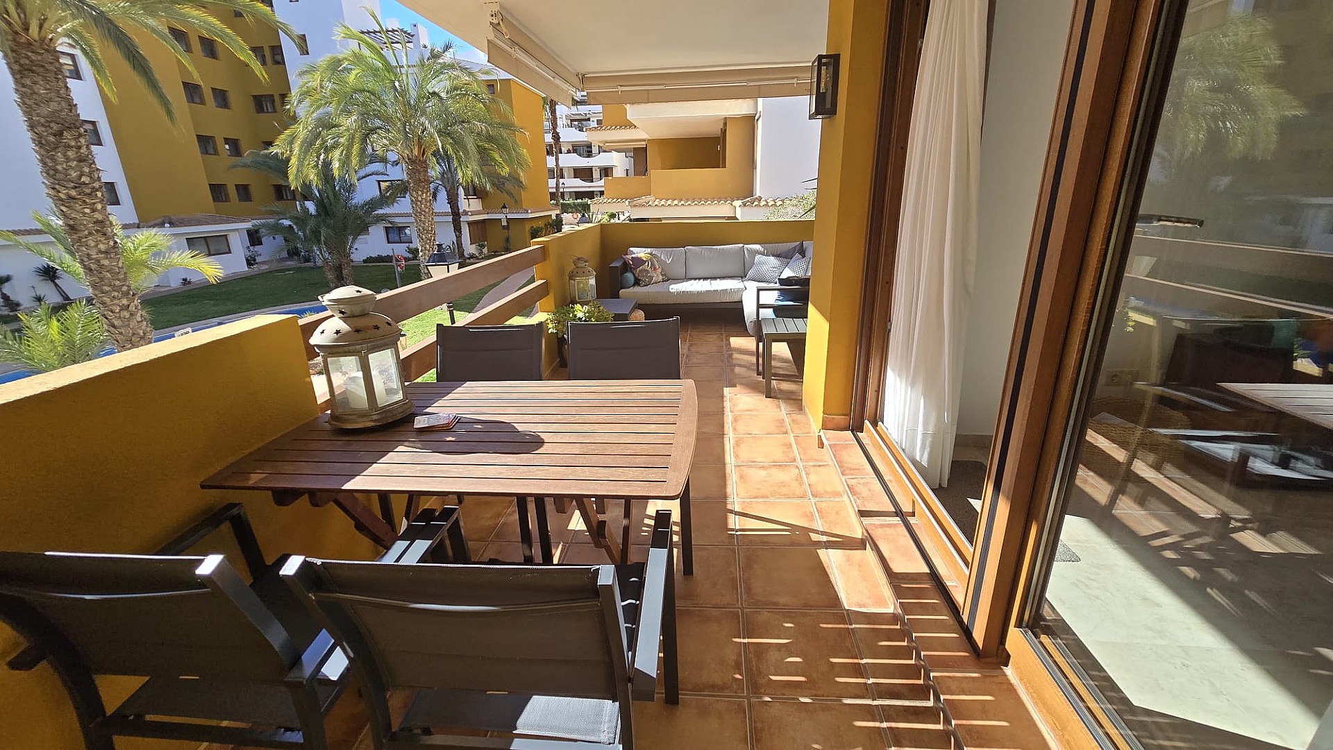 Pool area in apartment for sale in Punta Prima