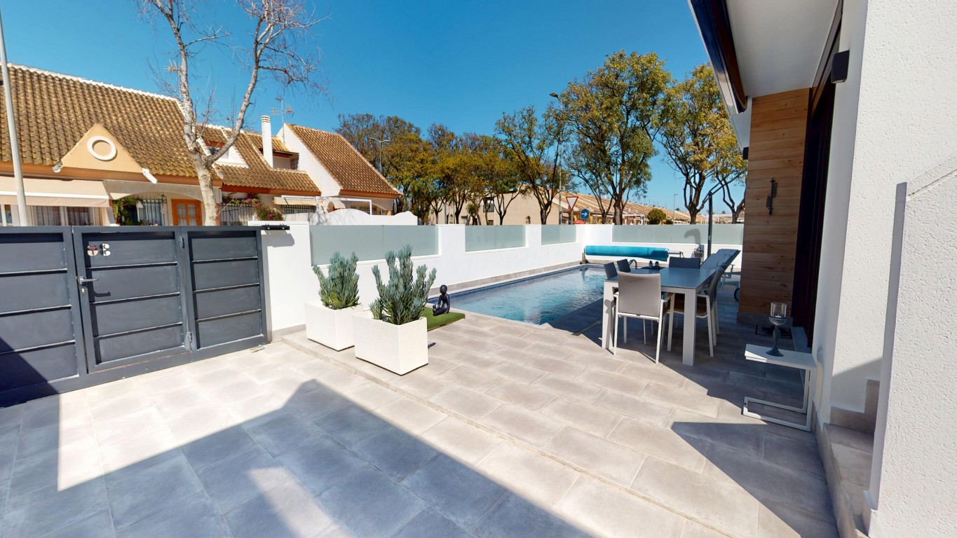 Pool area in villa for sale in Los Alcazares