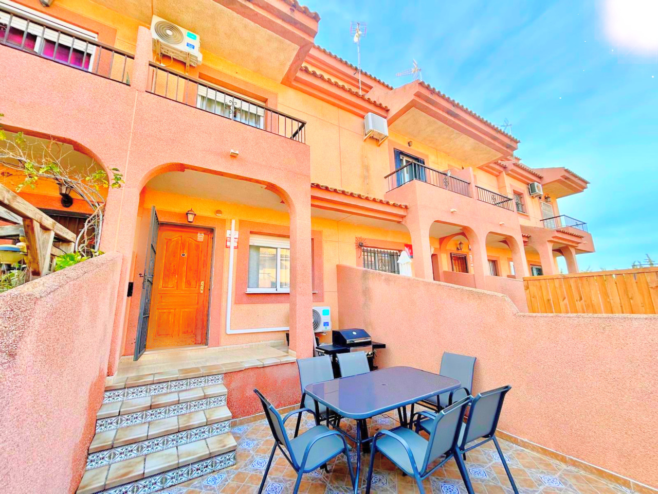 This spacious 4-bedroom townhouse offers the perfect combination of privacy, outdoor living, and con