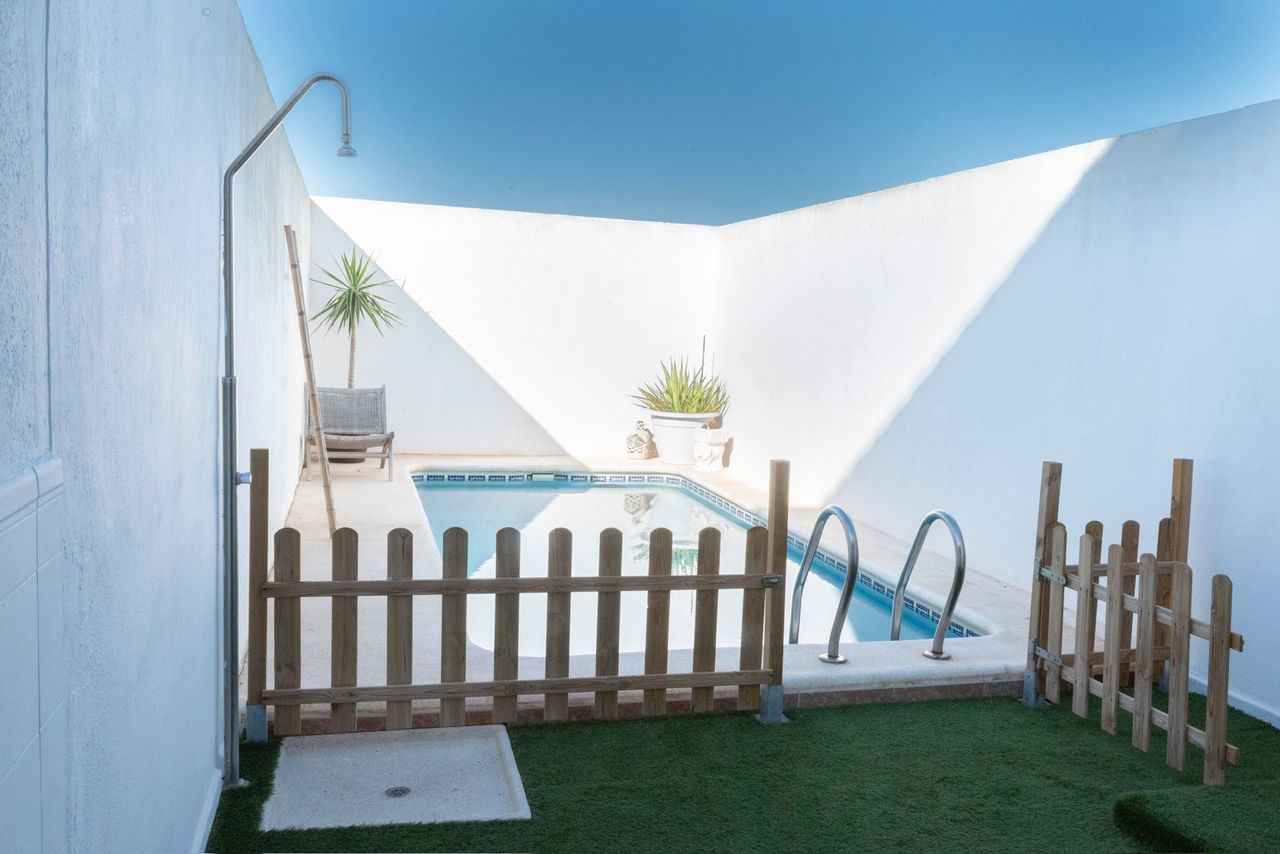 This spacious 4-bedroom townhouse offers the perfect combination of privacy, outdoor living, and con