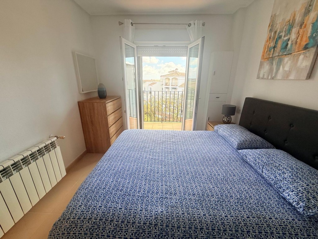 Bedroom in penthouse for sale in Hacienda Riquelme Golf Resort