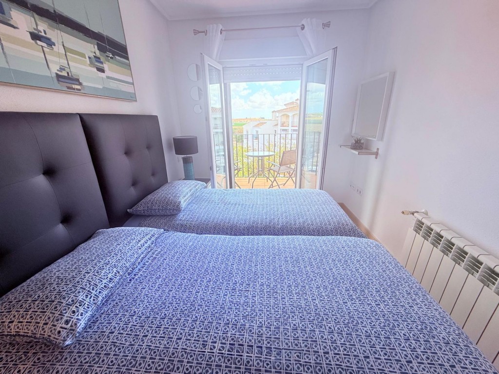 Master bedroom in penthouse for sale in Hacienda Riquelme Golf Resort