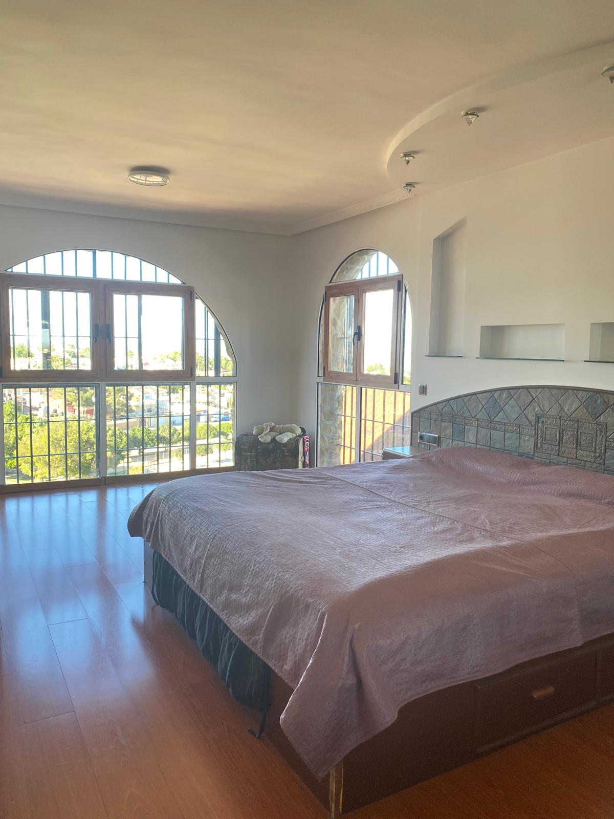 Pool area in villa for sale in Torrevieja