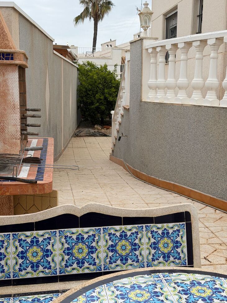 Pool area in villa for sale in Playa Flamenca
