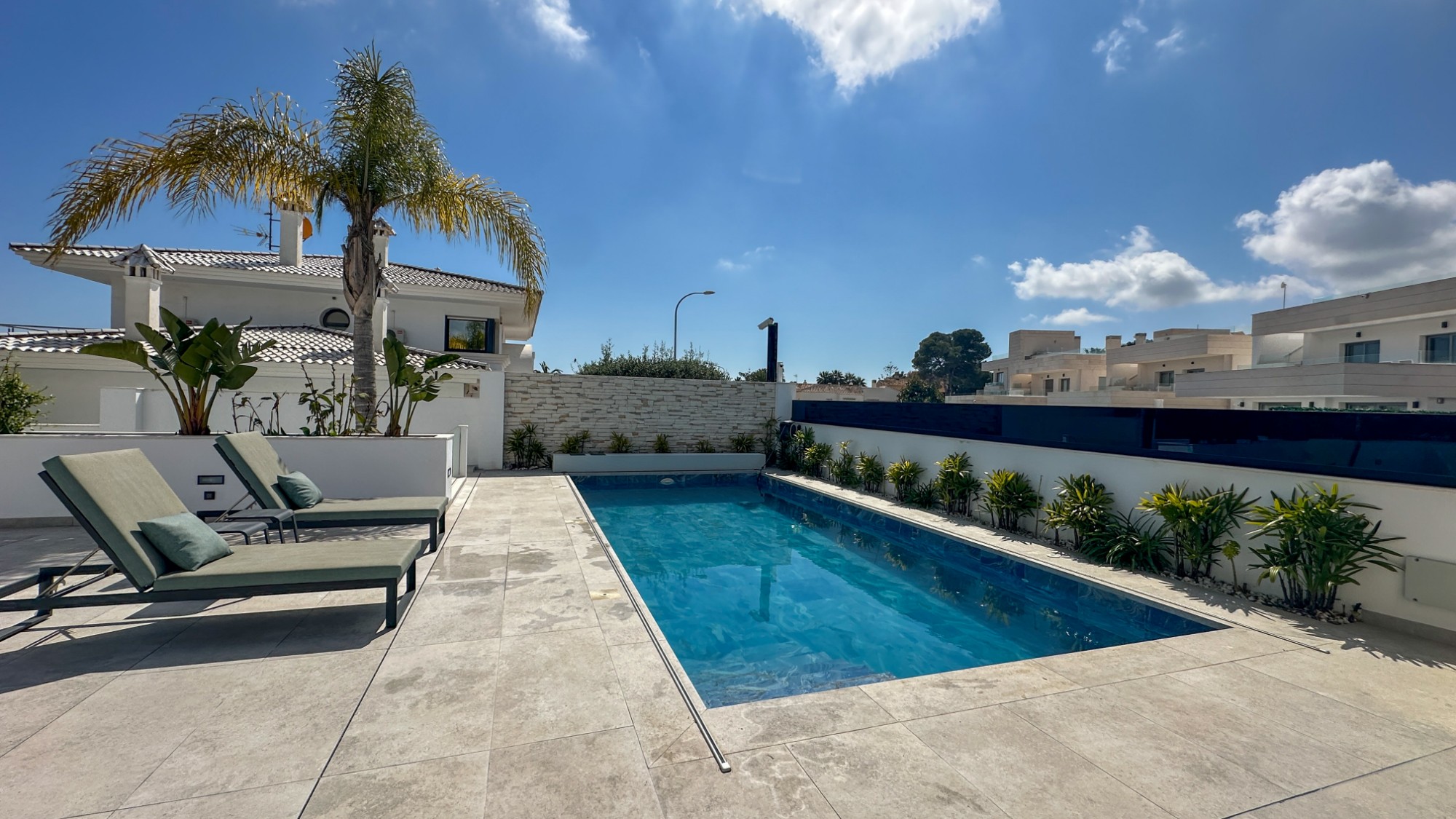 Pool area in villa for sale in Orihuela Costa