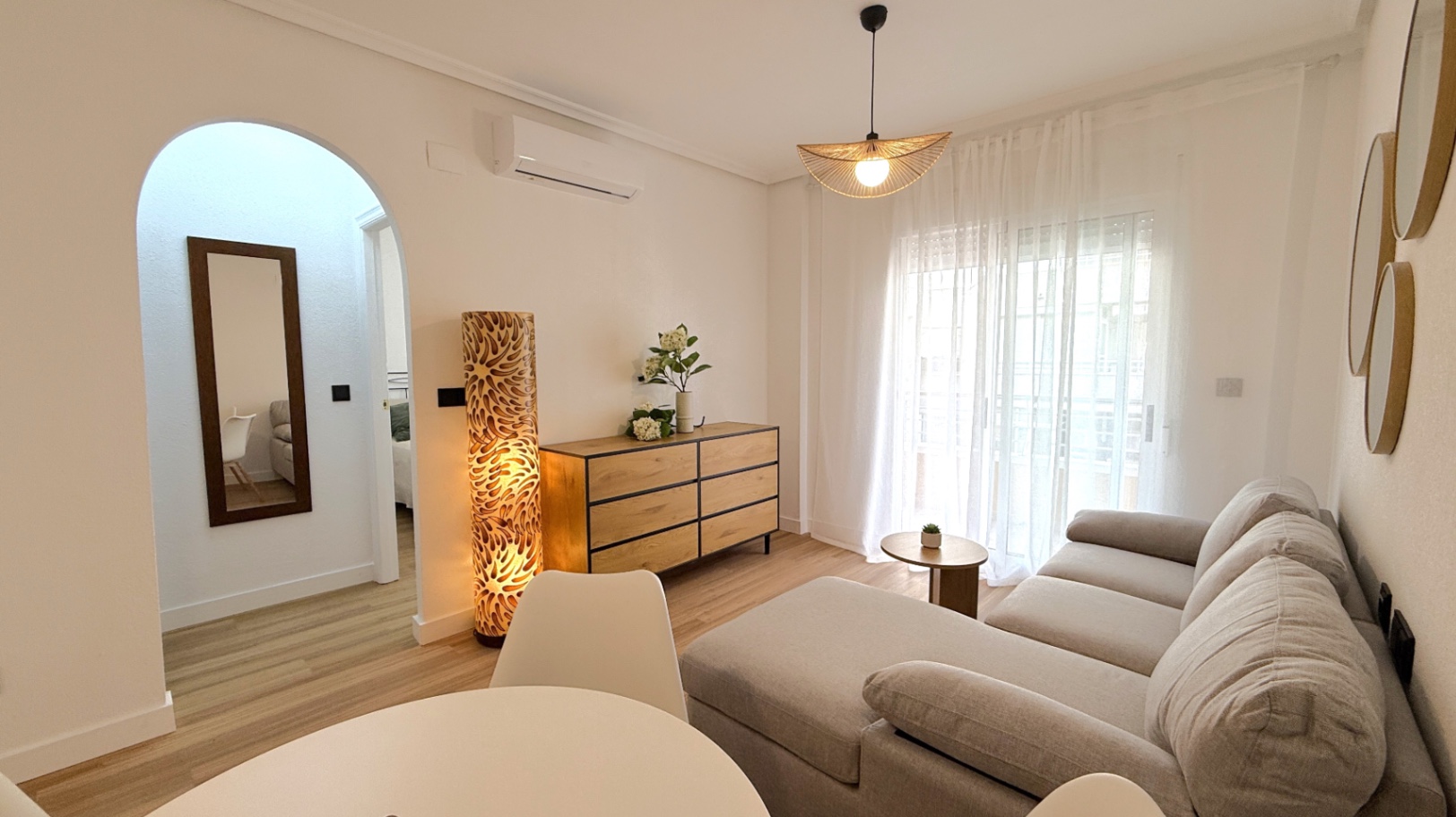Discover this beautifully fully refurbished 2-bedroom, 1-bathroom apartment located on Calle Villa M
