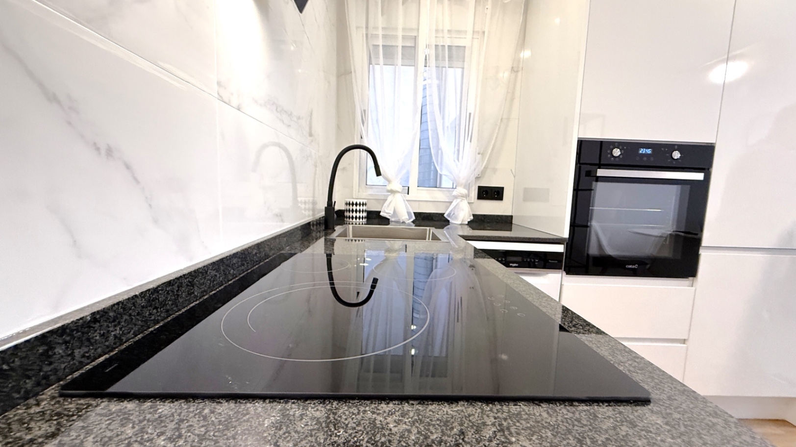 Discover this beautifully fully refurbished 2-bedroom, 1-bathroom apartment located on Calle Villa M