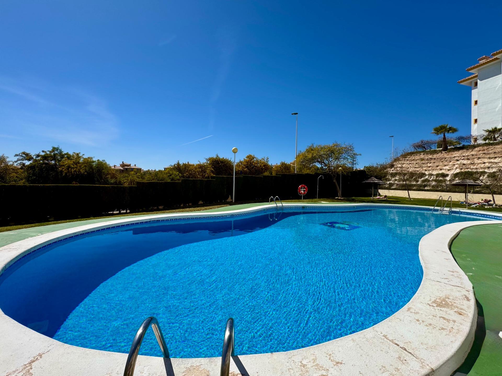 Pool area in apartment for sale in Orihuela Costa