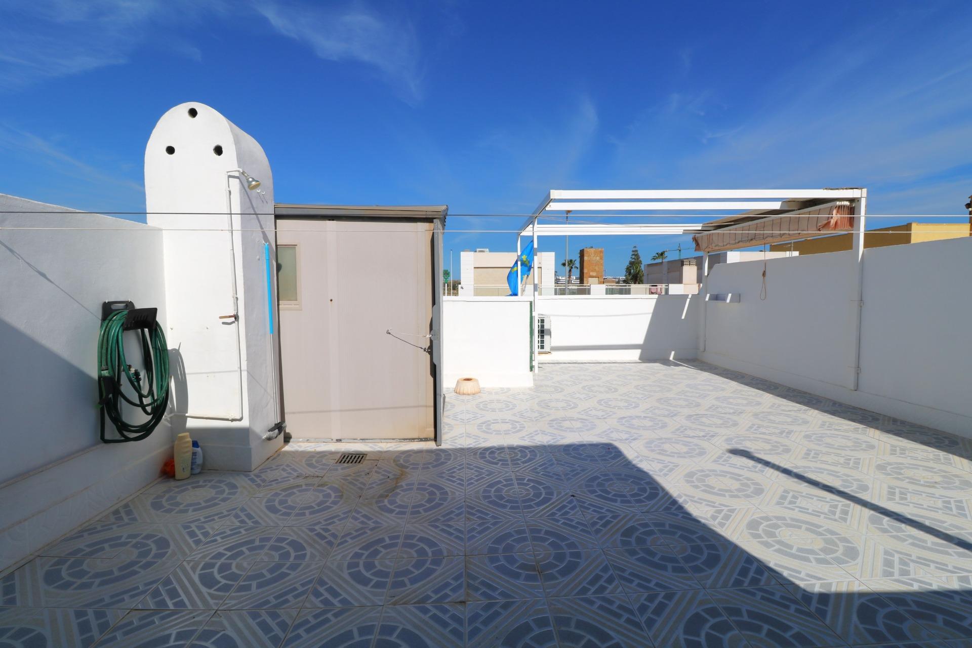 Pool area in bungalow for sale in Torrevieja
