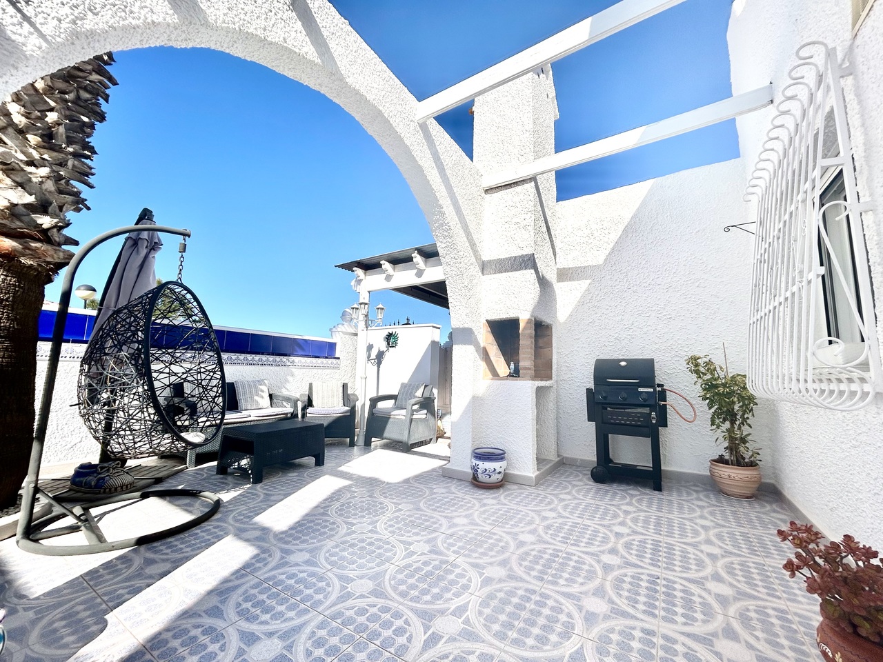 Pool area in villa for sale in Villamartin