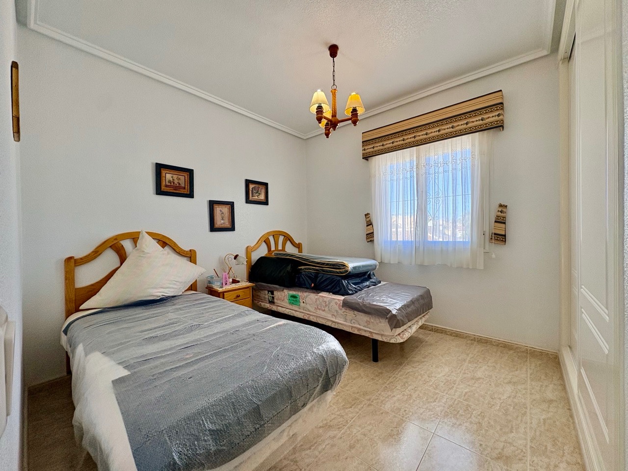 Master bedroom in terraced for sale in Rojales