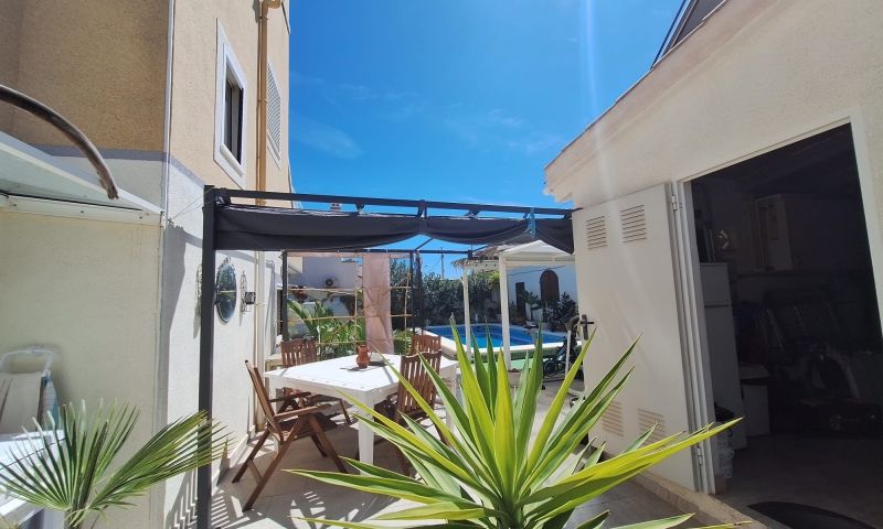 Pool area in villa for sale in Orihuela Costa