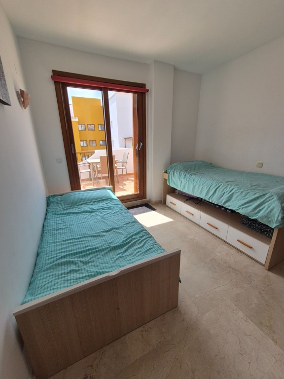 Living room in apartment for sale in Punta Prima