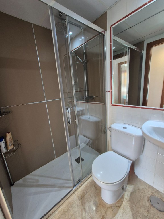 Master bedroom in apartment for sale in Punta Prima