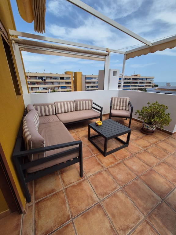 Terrace in apartment for sale in Punta Prima