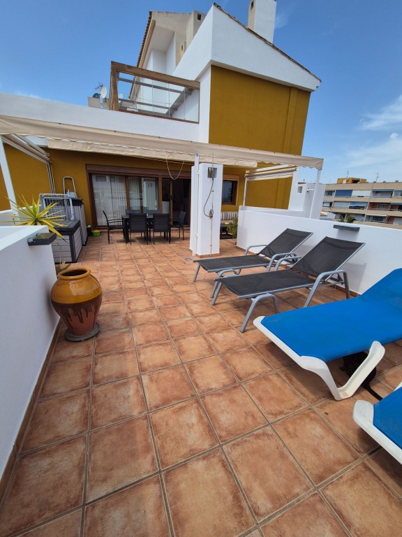Garden in apartment for sale in Punta Prima