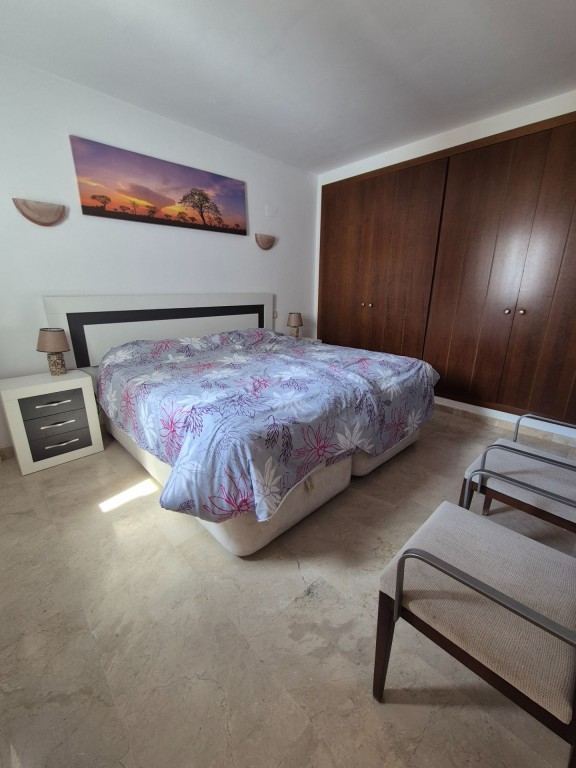 Pool area in apartment for sale in Punta Prima
