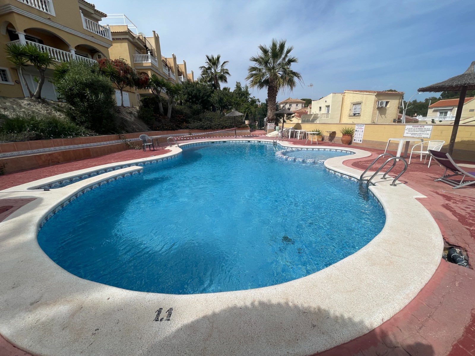 Pool area in villa for sale in San Fulgencio