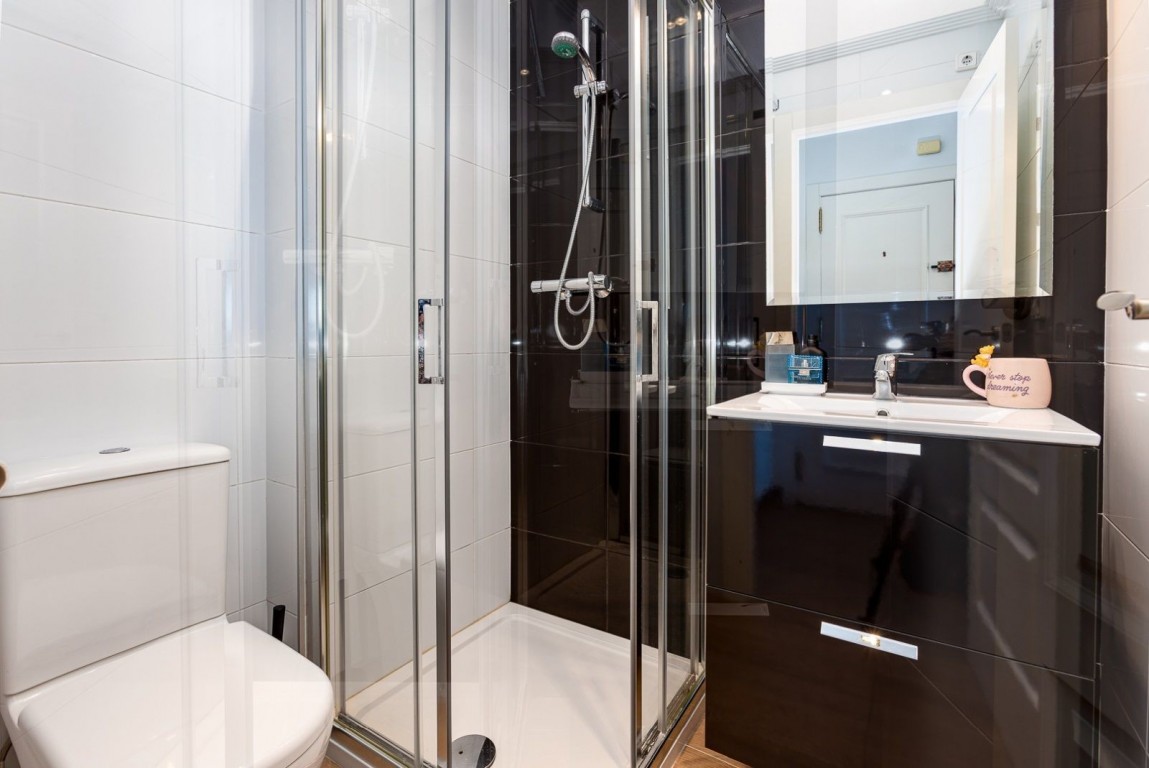 Living room in penthouse for sale in Lomas De Campoamor