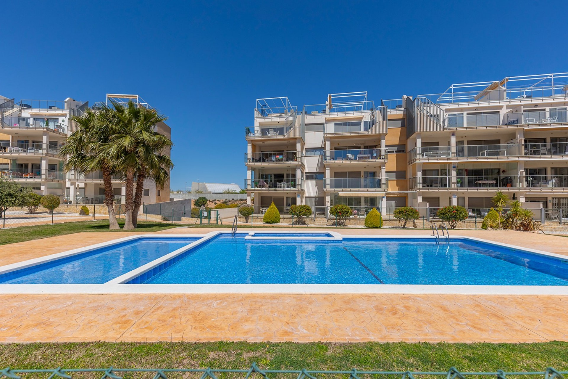 Pool area in apartment for sale in Orihuela Costa