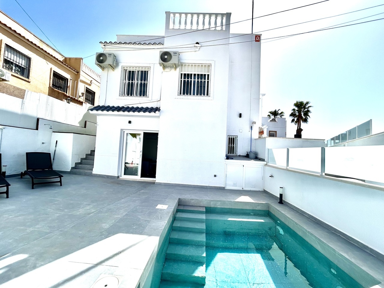 Pool area in villa for sale in Villamartin