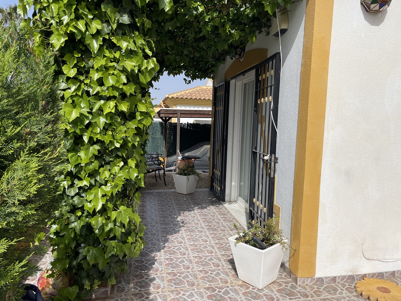Pool area in villa for sale in Mazarron Country Club