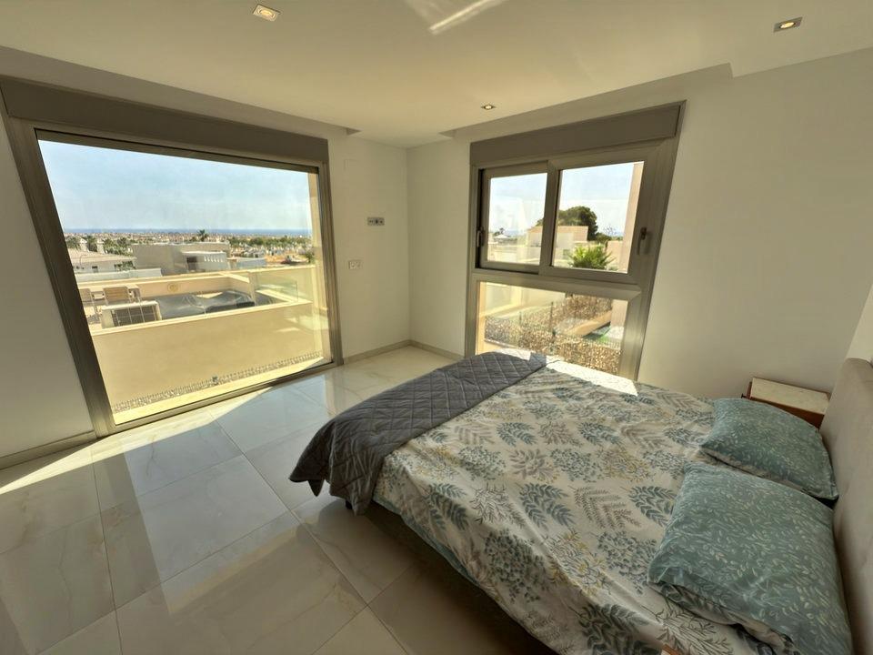 Pool area in villa for sale in Orihuela Costa