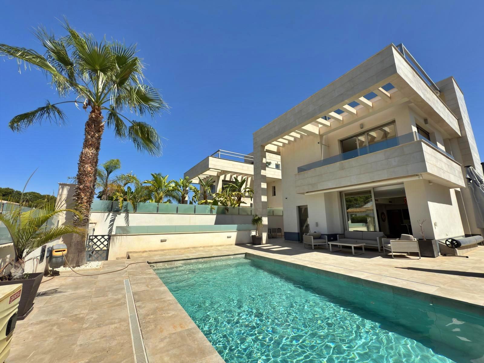 Pool area in villa for sale in Orihuela Costa