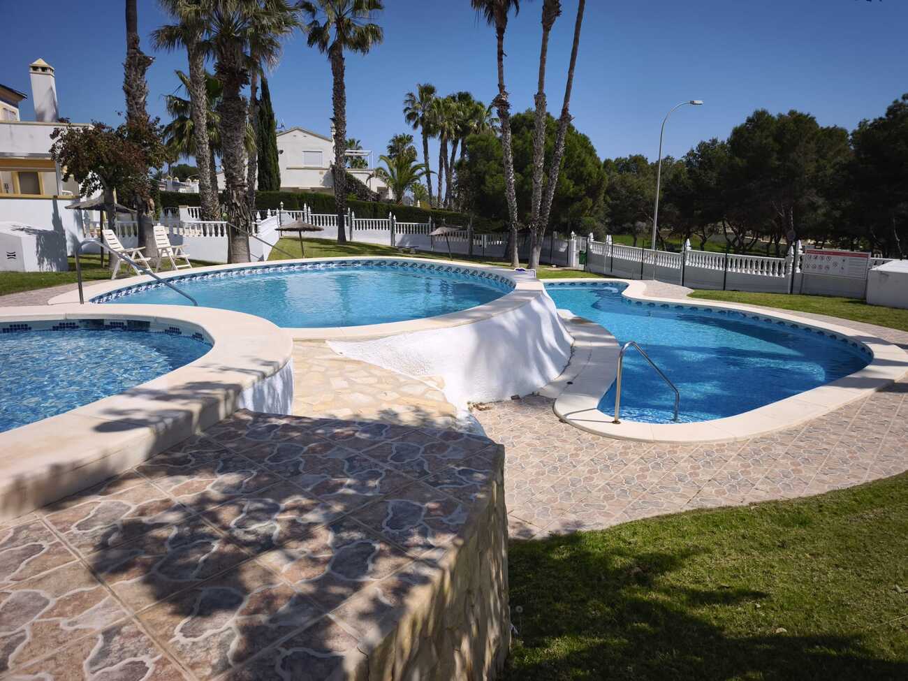 Pool area in bungalow for sale in Villamartin