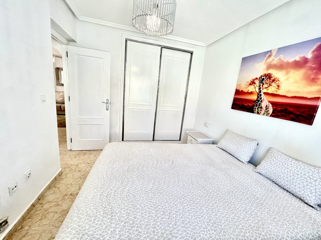 Master bedroom in terraced for sale in Punta Prima
