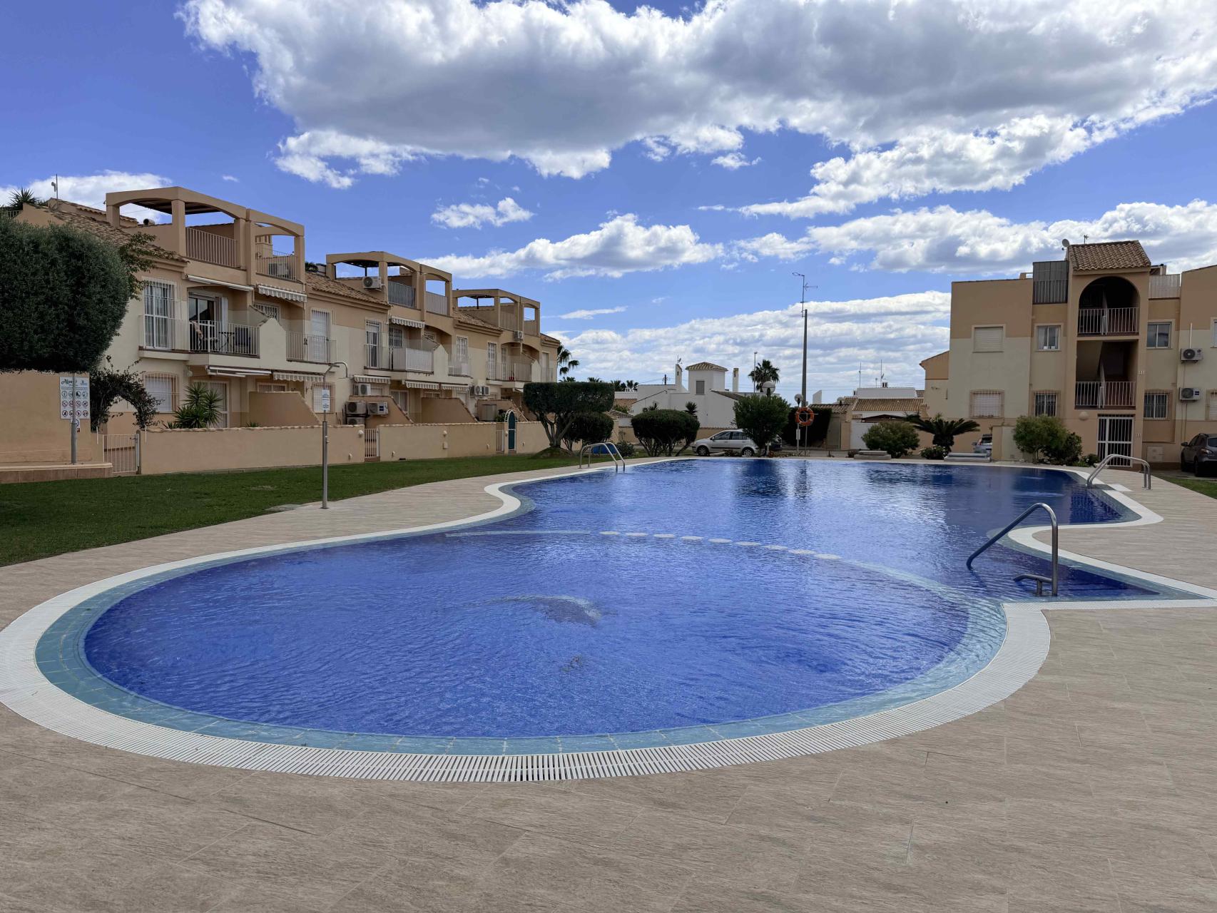 Pool area in bungalow for sale in Orihuela Costa