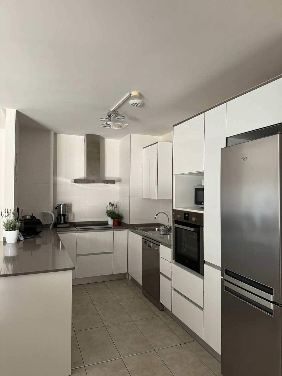 Stunning ground-floor apartment with a very large terrace Description Bright living room opening directly onto a large private terrace, with unobstructed views of the park