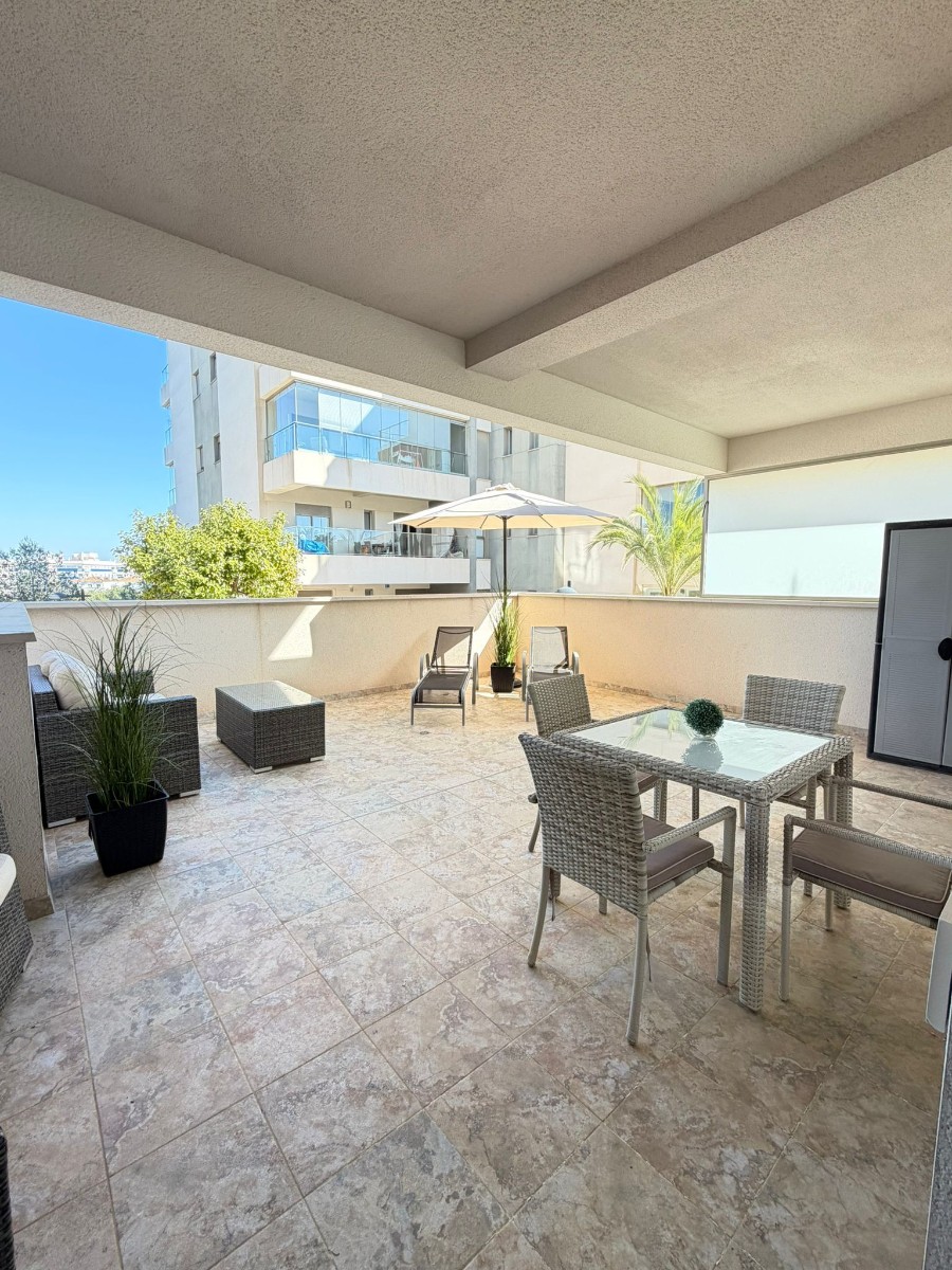 Stunning ground-floor apartment with a very large terrace Description Bright living room opening directly onto a large private terrace, with unobstructed views of the park