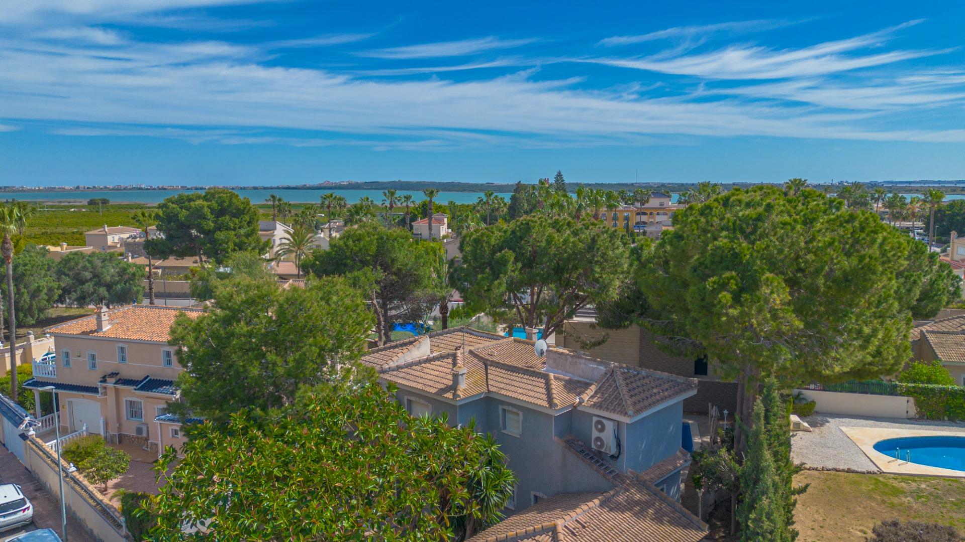 Pool area in villa for sale in Rojales